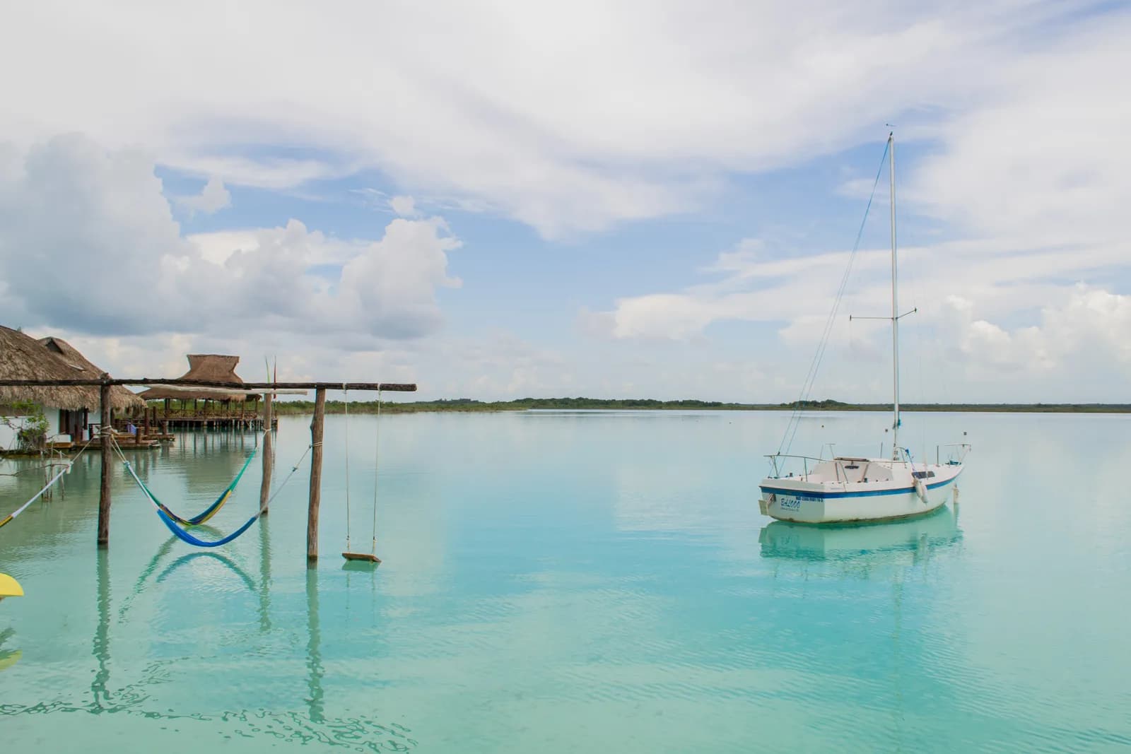 Bands of turquoise and deep blue water on the Lagoon of Seven Colors at Bacalar, Quintana Roo, Mexico