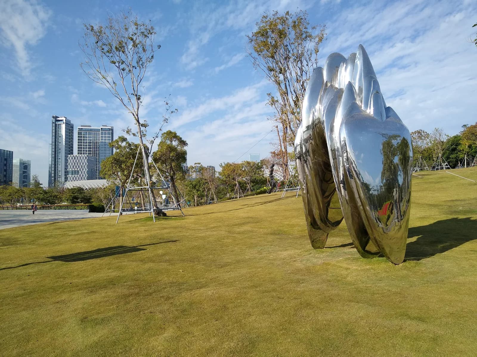 The waterfront path and skyline view at Shenzhen Bay Park, Nanshan district, Shenzhen