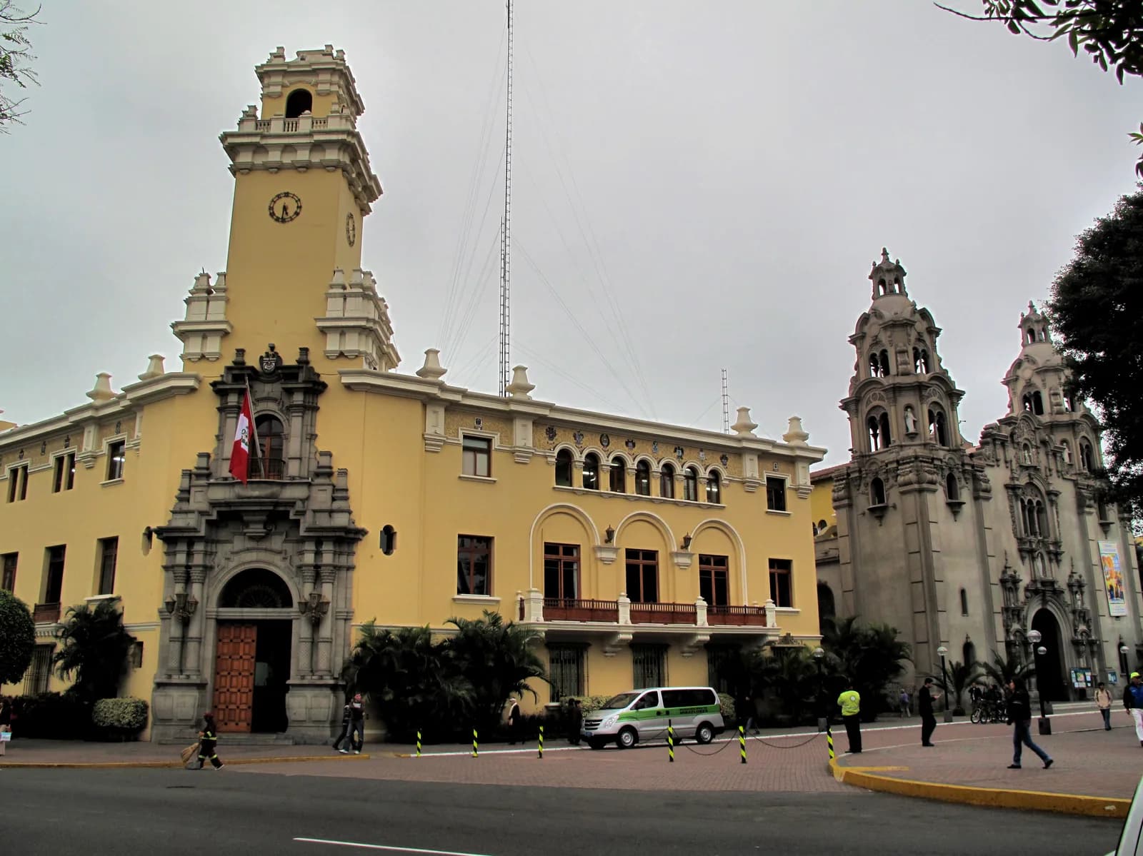 Palm trees, flower beds and paths in Parque Kennedy, the central park of Miraflores, Lima