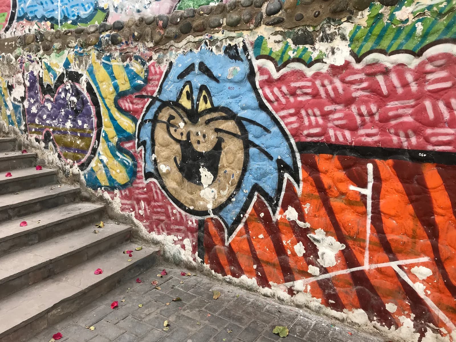 A large colorful mural covering a building wall in the Barranco district of Lima, Peru