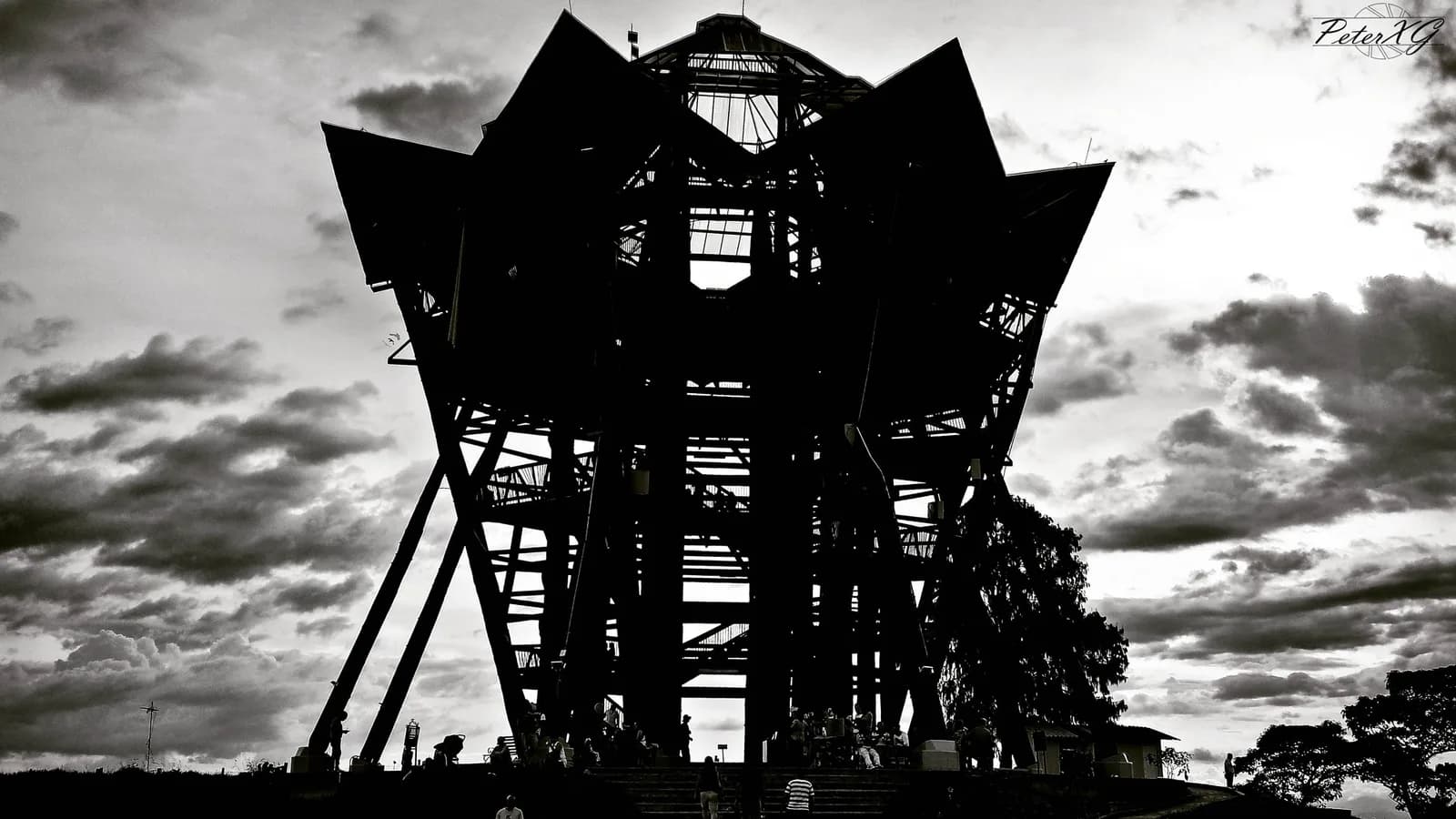 The wooden spiral tower of the Mirador Colina Iluminada viewpoint above Filandia, Colombia