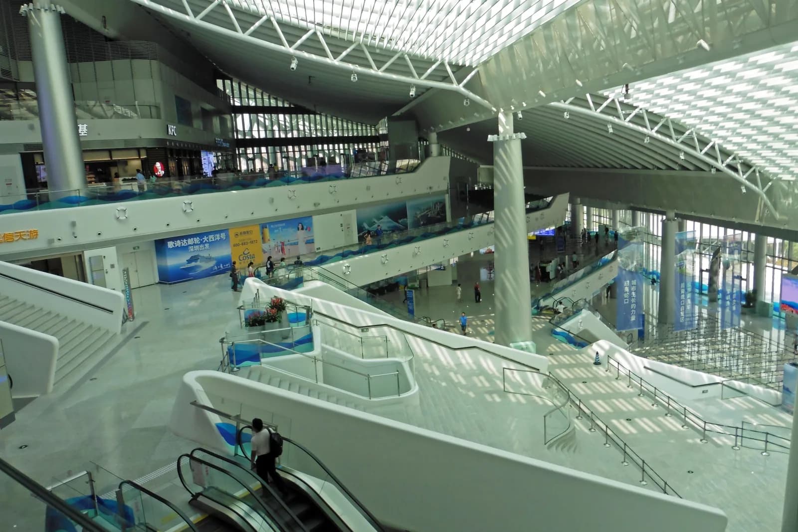 The glass sail-shaped building of the Shekou Cruise Center ferry terminal in Shenzhen
