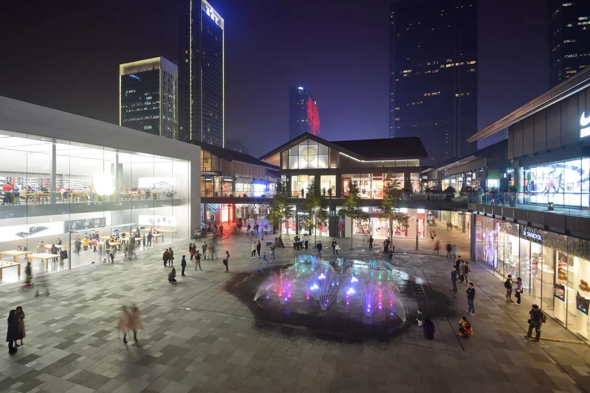 Sino-Ocean Taikoo Li in central Chengdu, low-rise lantern-lit shopping lanes beside modern towers