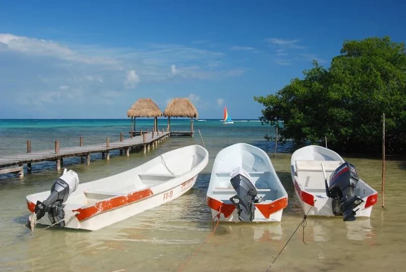 Turquoise Caribbean water and a quiet sandy beach beside the village of Mahahual, Mexico